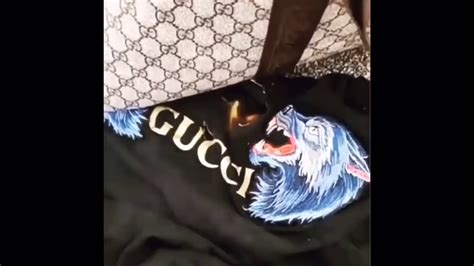 burning gucci shirt